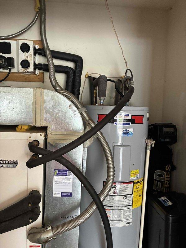 Conducted on-site evaluation of existing Water Furnace geothermal HVAC system installed in residential utility area. Assessed current equipment configuration including ground-source heat pump unit, associated ductwork connections, and mechanical room layout to provide comprehensive replacement system quote. Presented available utility rebate options and discussed geothermal system replacement alternatives based on customer inquiry.
