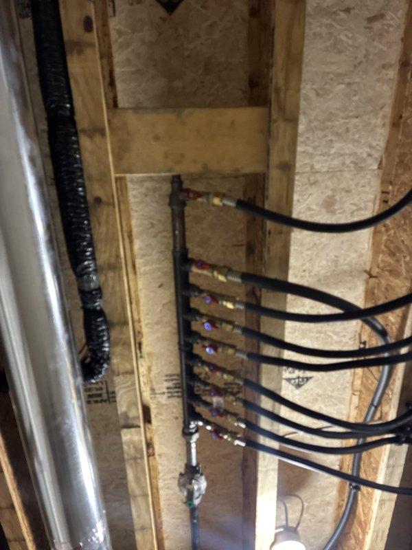 Completed dryer vent repair by sealing missing joints with foil tape and installing additional metal strapping between existing supports to ensure proper ventilation system stability and code compliance. All connections were secured and tested for proper airflow.