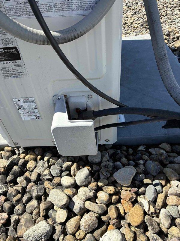 Responded to service call for non-operational mini split system serving server room in commercial office building. Accessed rooftop-mounted outdoor condensing unit and performed diagnostic evaluation of split system components. Documented equipment condition, refrigerant line connections, electrical disconnect, and overall installation setup to provide comprehensive estimate for system repair or replacement.
