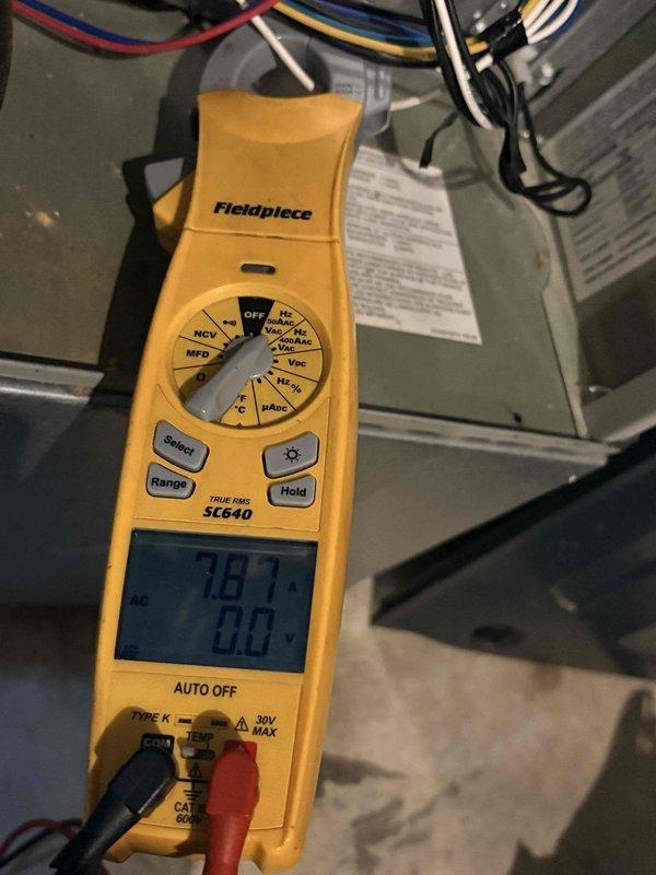 Completed scheduled preventive maintenance tune-up on heating system 1. Inspected and cleaned flame sensor rod to ensure proper flame detection and system safety. Performed electrical diagnostics using digital multimeter, verifying voltage readings at 78.7V and amperage draw at 0.8A, confirming proper electrical operation within manufacturer specifications. Inspected all wire connections, control board functionality, and verified system is operating correctly with no issues found. Confirmed membership coverage and advised that this was the final cleaning visit included in the current maintenance plan, with membership remaining active through April 2027.