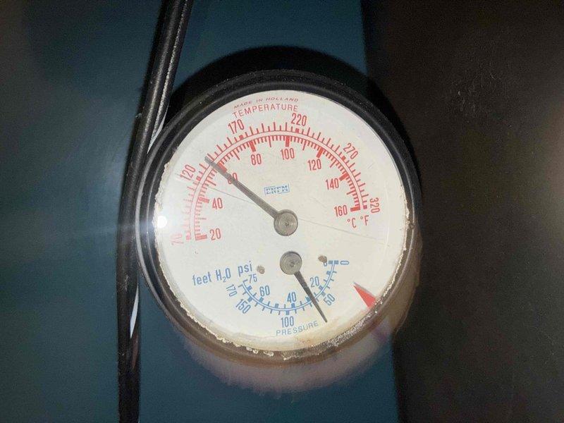 Responded to no-heat call for Burnham Series 2 gas boiler of unknown age. Upon inspection, found extensive corrosion on main supply piping and valve assembly, with deteriorated paint and significant rust buildup indicating prolonged moisture exposure. Evaluated system pressure and temperature readings via control gauge, assessed overall system condition, and documented corroded components requiring attention to restore proper operation and prevent future system failure.