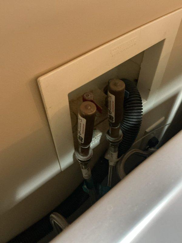 Responded to service call for continuously running ejection pit system. Upon arrival, conducted thorough inspection of the ejection pump assembly and associated plumbing components located in the bathroom area. Accessed the wall-mounted plumbing panel to examine water supply lines, shut-off valves, and connection points. Evaluated the ejection pit pump operation and checked for proper cycling, float switch functionality, and discharge line integrity. Documented existing conditions through photographs showing the plumbing access panel with visible supply lines, metal valves with identification tags, and flexible discharge hose connections. Assessed the overall bathroom plumbing system including dual-sink vanity setup to ensure no related issues were present. Determined that ejection pit pump requires replacement due to continuous running condition indicating probable float switch failure or internal pump malfunction. Provided documentation and recommendations for pump replacement to res
