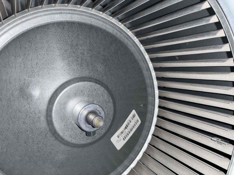 Performed late season air conditioning maintenance and cleaning. Inspected blower assembly and verified fan wheel condition, finding all blades intact with no debris accumulation. Measured capacitance at 28.6 MFD using digital multimeter and verified electrical connections at control panel, confirming all wiring secure and system operating within normal parameters.