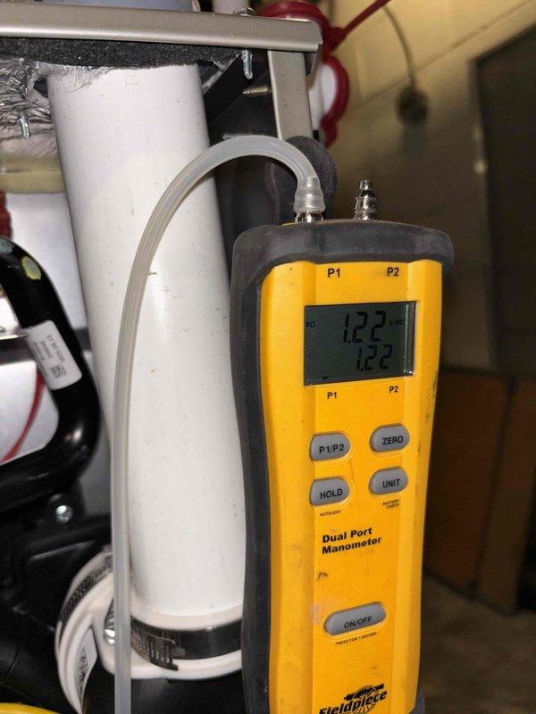 Completed scheduled prepaid heating maintenance on Carrier Infinity furnace system. Performed comprehensive system inspection, measured gas pressure at 122" w.c. using dual port manometer, verified proper operation of all components including control board and safety switches. System operating within manufacturer specifications with no deficiencies noted.
