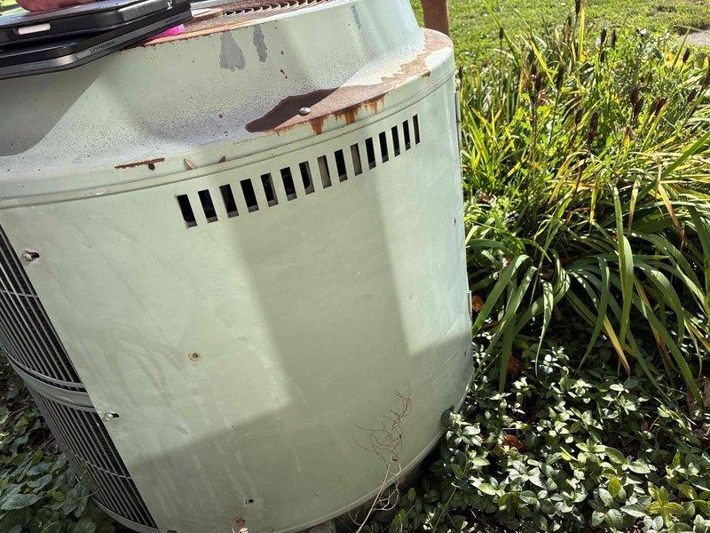 Completed full system estimate for HVAC replacement at residential property. Existing outdoor condenser unit shows significant rust corrosion on upper housing with visible streaking and deterioration from extended weather exposure. Indoor furnace located in basement with standard ductwork configuration. Customer was referred for complete system replacement evaluation, and comprehensive assessment of both heating and cooling equipment was provided with replacement recommendations.