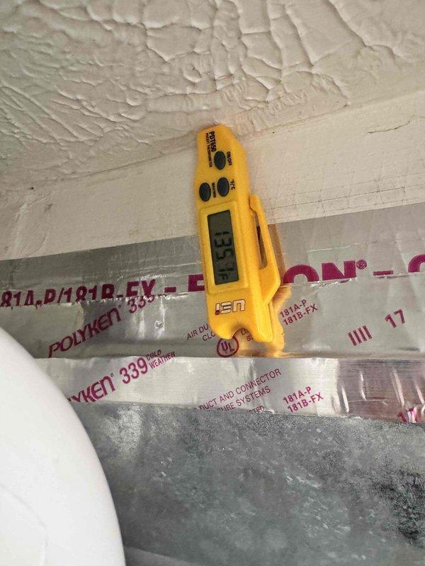 Performed a seasonal heating tune-up on a Carrier vertical gas furnace with condensate drain and PVC venting, inspecting the unit, gas and electrical connections, and condensate line. Verified supply duct temperature of approximately 136°F using a digital thermometer, confirming proper heat output, and noted no visible rust, frost, or damage. Advised the customer of available maintenance plan options.