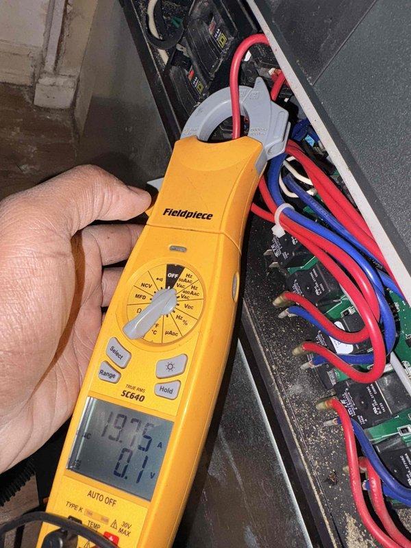Performed annual heating maintenance on a 10+ year old system, including cleaning the blower wheel to remove accumulated dust and debris that was restricting airflow. Inspected the control panel and wiring, and verified blower motor amp draw at approximately 19.75 A using a true RMS clamp meter.