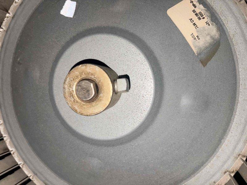 Performed a heating tune-up on the furnace, including measurement of static pressure across the system with a dual port manometer (approximately 3.6 inWC), indicating elevated static pressure that may be restricting airflow. Inspected the blower assembly and found moderate dust and grime buildup on the blower wheel blades, with scuffing and wear on the hub, and verified the wiring harness and internal components showed no obvious damage, rust, or frost.
