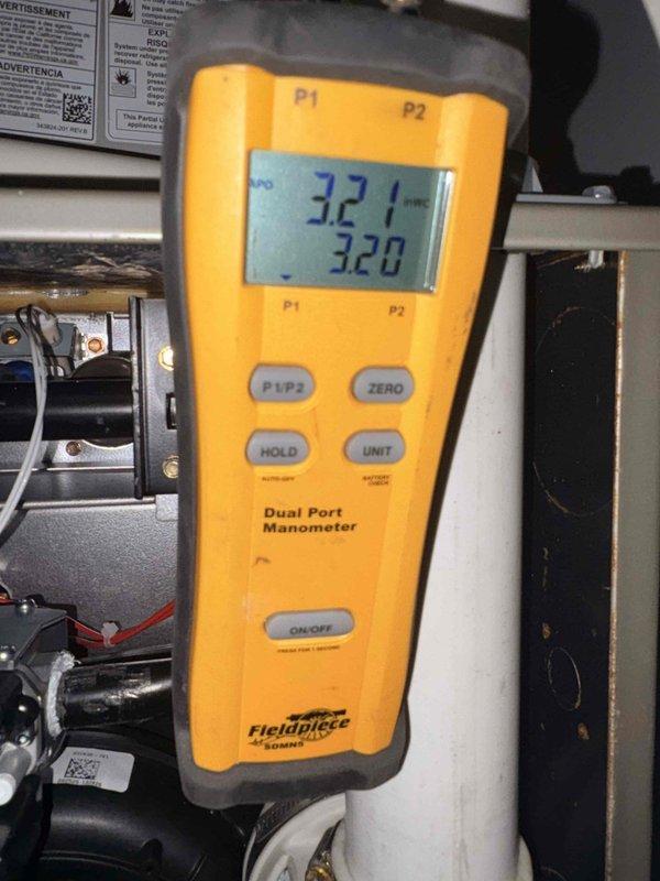 Replaced the furnace control board, inducer assembly, and gas valve to restore proper ignition and combustion operation. Verified gas manifold pressure with a dual-port manometer after installation and confirmed the unit is operating within specification. Noted deteriorated burner compartment insulation and minor surface rust near the burner and gas valve area for future monitoring.