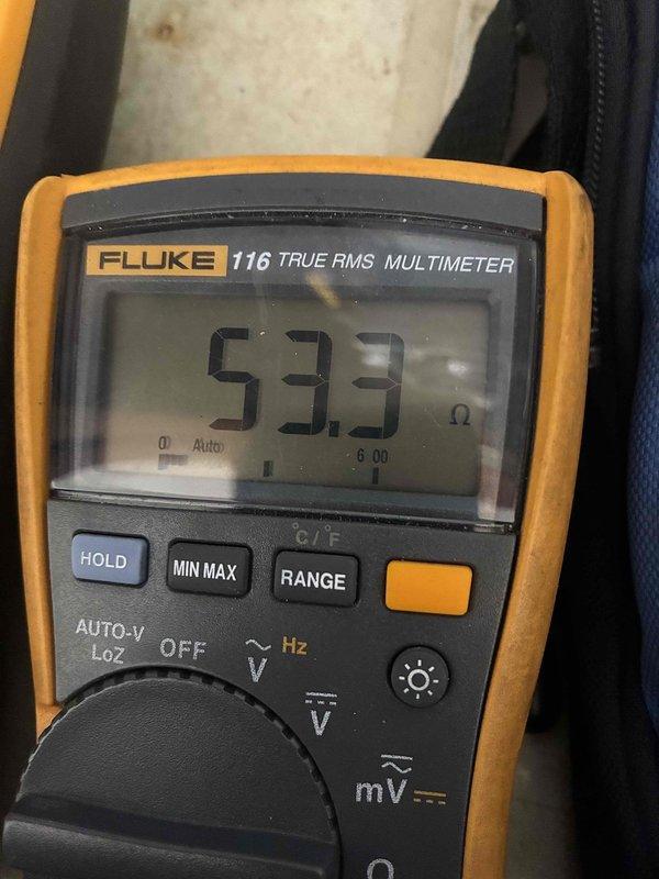 Performed scheduled seasonal heating maintenance on the heating system, with electrical diagnostics conducted using a True RMS digital multimeter and clamp meter. Resistance was verified at 53.3 Ω to confirm component continuity, and AC amperage draw was measured at the clamp meter to evaluate motor and circuit operation, with readings recorded for baseline comparison. The humidifier and mini-split were included in the winter service scope, and all tested components were found to be within normal operating parameters.