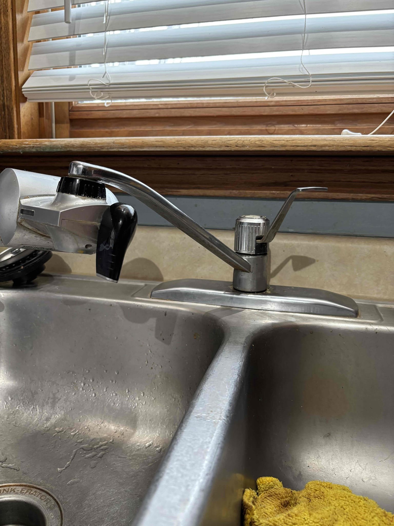 Installed owner provided kitchen faucet. Reconnected to existing water supply stops for hot & cold. Replaced seal for supply stops due to them not turning off fully. After installation, ran tests. No leaks. 