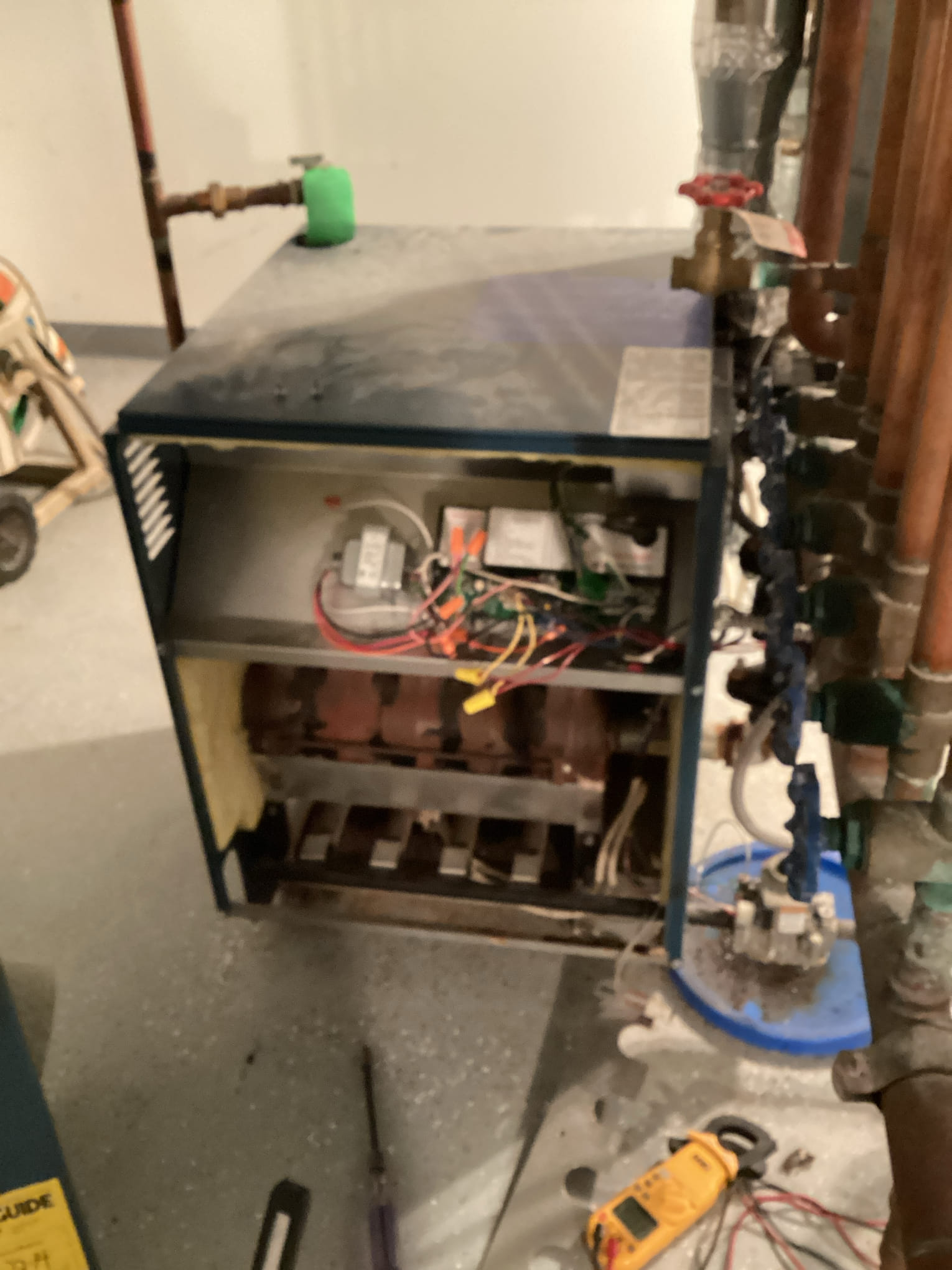 The inducer was continuously running. I found the gas valve was not opening and the boiler was not heating. I replaced the gas valve and set up for l.p. operation. The boiler is working properly. 
2 zone valves have the end switches disconnected and 1 other has a bad motor. The homeowner uses the boiler as back up heat only and is not concerned with the zone valves at this time