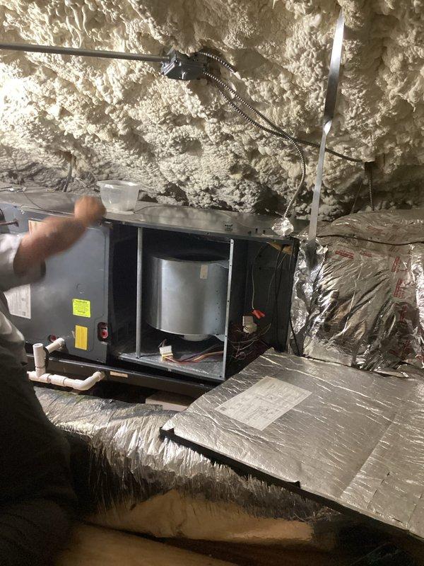 Diagnosed ECM motor failure in attic-mounted air handler unit. Replaced defective ECM motor, but discovered replacement part was also faulty. Will return to complete repair with new motor component.