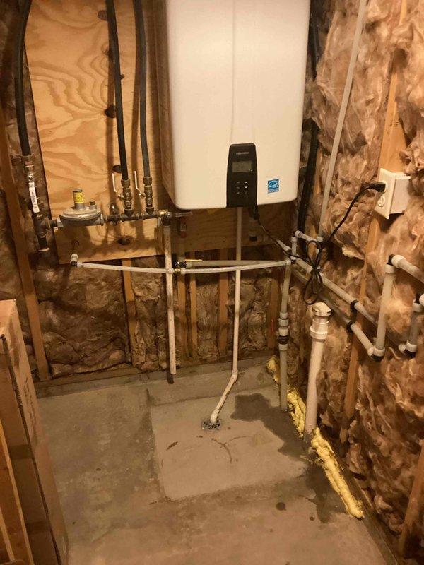 Completed the installation of a freeze-proof hose bibb with up to 15' of PEX tubing in a medium access location to prevent spigot freezing during cold weather. Installed new outdoor spigot with dedicated shut-off valve and connected the customer's drain line to their bathtub.