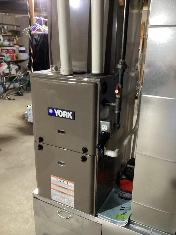 Diagnosed and replaced a faulty gas valve and installed a new 1/2-3/4 inch AGA ball valve shutoff on York furnace that was not producing heat. After completion of the 2-hour repair, tested system operation and confirmed the furnace is now functioning properly with normal heating capacity restored.