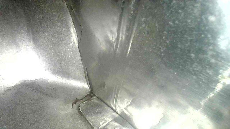 Performed routine tune-up on 11-year-old furnace system. Inspection revealed cracked heat exchanger, which was promptly replaced. Photographic documentation of metal ductwork and connection points was completed during service.