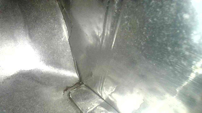 Performed routine tune-up on 11-year-old furnace system. Inspection revealed cracked heat exchanger, which was promptly replaced. Photographic documentation of metal ductwork and connection points was completed during service.