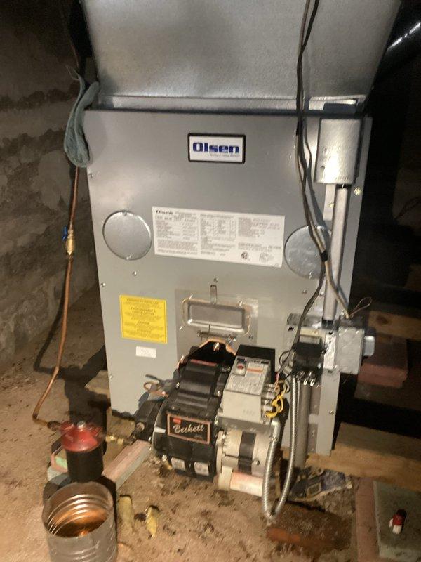 Performed scheduled bi-annual maintenance on two furnaces (LP and oil) under Reward membership agreement. Gas furnace in main residence inspected and functioning properly with all systems verified operational. Oil furnace in rental property serviced including nozzle cleaning; however, unit flame deteriorated after approximately five minutes of operation and extinguished. Fuel sample revealed significant water contamination in oil tank. Recommended customer contact fuel supplier for tank replacement and fresh fuel delivery, after which a follow-up service will be required to replace nozzle, oil filter, and perform system flush.