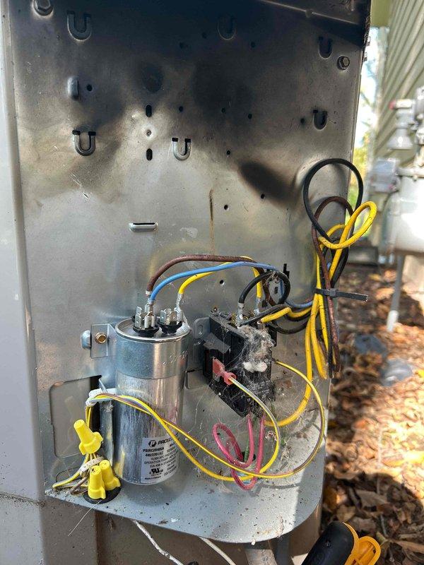 Diagnosed no cooling issue on 5-year-old Bryant air conditioning system, identifying failed capacitor and hard start kit. Replaced capacitor, verified refrigerant charge with Fieldpiece diagnostics showing proper superheat (9.1°F) and subcooling (11.2°F) values, and confirmed system operation restored to normal.