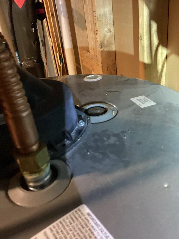 Responded to customer complaint of sulfur odor from hot water system. Inspected Rheem water heater and diagnosed issue as deteriorated anode rod. Performed service including anode rod replacement and complete tank flush to eliminate odor-causing bacteria. Evaluated existing water softener which was experiencing frequent salt bridging issues; recommended replacement with cabinet-style unit including sediment filter to prevent future mineral buildup in water heater. Customer opted for water heater maintenance now with water softener installation to follow.
