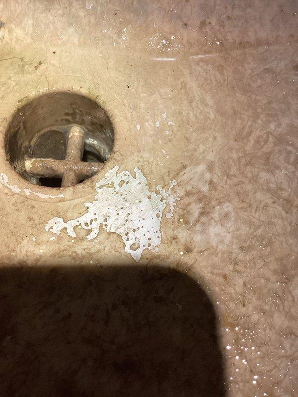 Responded to low water pressure complaint in residence on city water supply. Inspection revealed mineral buildup in fixtures and potential connection to ongoing roadwork in the area. Advised customer to contact city utilities department and check with neighbors about similar issues. Bypassed water softener system to isolate potential internal restriction point. Recommended monitoring pressure levels as city work progresses.