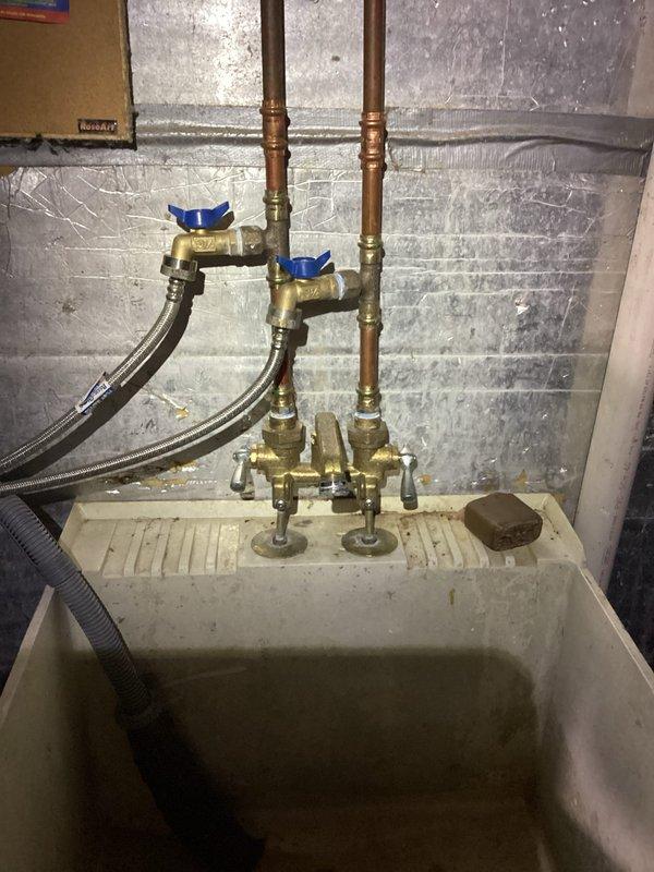 Responded to low water pressure complaint in residence on city water supply. Inspection revealed mineral buildup in fixtures and potential connection to ongoing roadwork in the area. Advised customer to contact city utilities department and check with neighbors about similar issues. Bypassed water softener system to isolate potential internal restriction point. Recommended monitoring pressure levels as city work progresses.