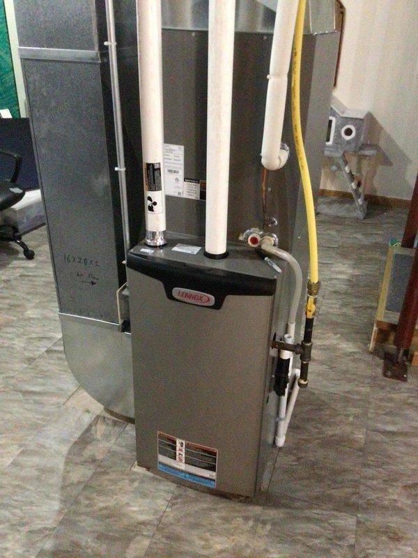 Performed scheduled furnace maintenance on 4-year-old Lennox unit. Completed standard tune-up procedures including filter replacement, flame sensor cleaning, and hose clearance verification. System is operating at optimal performance with no issues detected.