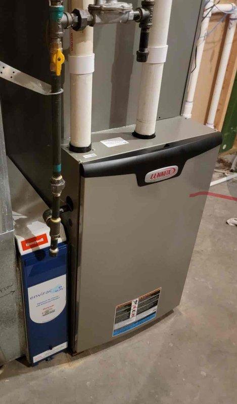 Performed routine furnace tune-up maintenance on Lennox heating system. Cleaned standard components, serviced humidifier drain, and replaced air exchanger filter. System functioning properly with no operational issues identified.