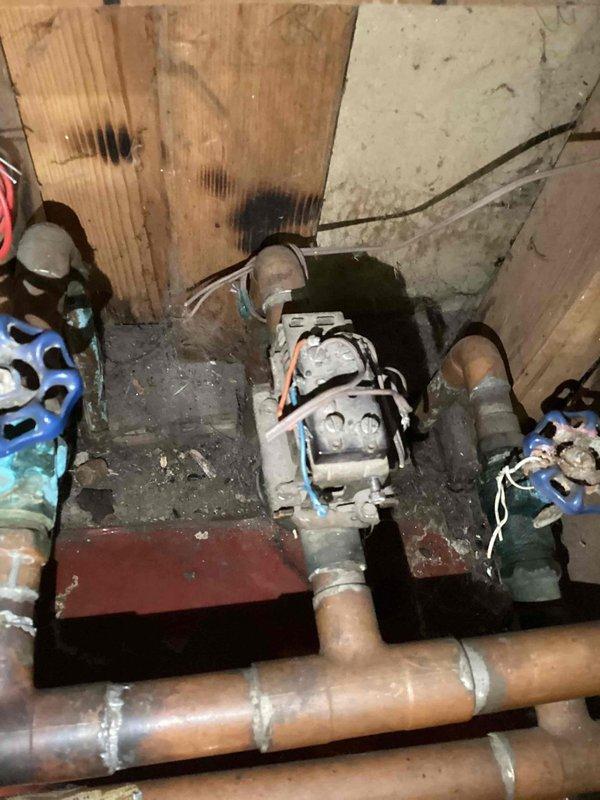 Performed on-site assessment of 30-year-old electric boiler system per customer request. Inspected existing plumbing infrastructure including copper piping, valves, and electrical connections in utility area. Evaluated current wood boiler setup and discussed supplemental heating options. Gathered necessary information to prepare estimate for replacement with either electric or LP boiler system.