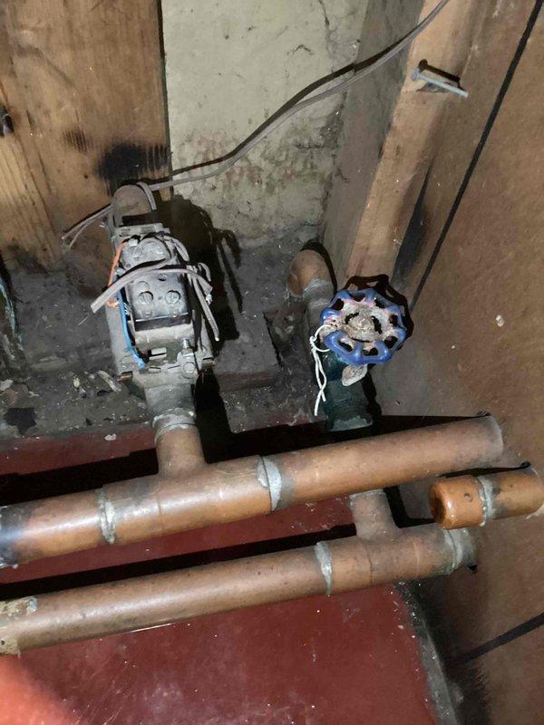 Performed on-site assessment of 30-year-old electric boiler system per customer request. Inspected existing plumbing infrastructure including copper piping, valves, and electrical connections in utility area. Evaluated current wood boiler setup and discussed supplemental heating options. Gathered necessary information to prepare estimate for replacement with either electric or LP boiler system.