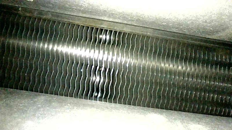 Performed annual furnace tune-up on unit of undetermined age. Replaced dirty air filter with customer-provided new one, cleaned flame sensor, and advised customer on proper air exchanger maintenance. Identified humidifier pad requiring replacement and provided homeowner with replacement options. Recommended regular filter changes every 30-90 days.