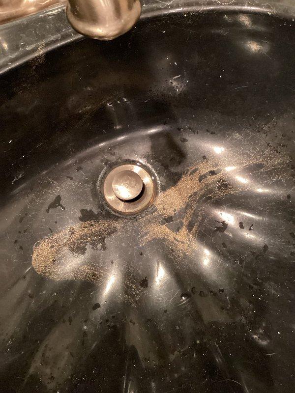 Diagnosed and identified water leak originating from the pop-up assembly underneath bathroom sink. Inspection revealed aging faucets in both downstairs and upstairs lavatory with operational issues in the upstairs drain assembly. Recommended and scheduled replacement of both lavatory faucets, with installation to be completed on Thursday.