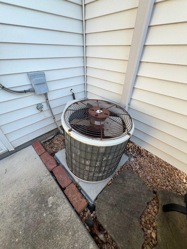 Diagnosed R22 system from 1997 with no cooling issue due to significant ice buildup on evaporator coil and refrigerant line. Performed R22 recharge to restore temporary cooling function. Identified aging system (25+ years) with deteriorating components; scheduled comprehensive system replacement estimate for Thursday morning.