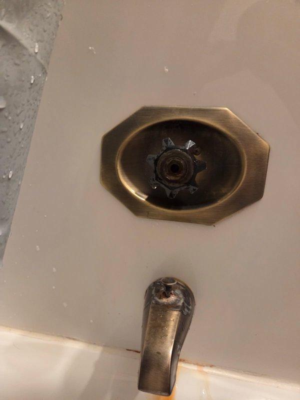 Conducted comprehensive assessment of both kitchen faucet and bathtub fixtures. Kitchen faucet showed binding issues with detached chrome lever handle, while bathroom tub faucet exhibited leaking with visible mineral deposits and corrosion around drain components. Provided customer with replacement options for both fixtures, noting that shower faucet replacement would require removal of Lazy Susan cabinetry and cutting access through the back panel.