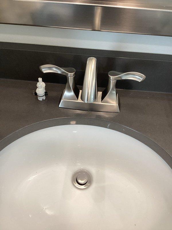 Responded to a warranty call for a dripping lavatory faucet that was recently installed on 9/16. Diagnosed issue and replaced the original Delta faucet cartridges with OEM Delta cartridges to resolve the dripping problem.
