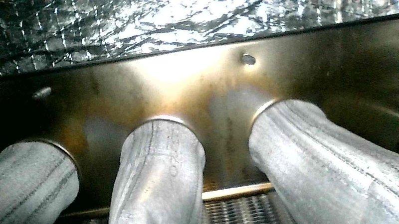Performed scheduled furnace tune-up on residential FRP unit (age unknown). Completed comprehensive maintenance including cleaning flame sensor, clearing drain and pressure switch ports, inspecting capacitors, and verifying burner condition. Visual inspection confirmed excellent heat exchanger condition with no issues. Tested operation in both first and second stage heating modes with proper functionality observed. Left spare filter on-site. System operating normally at completion of service.