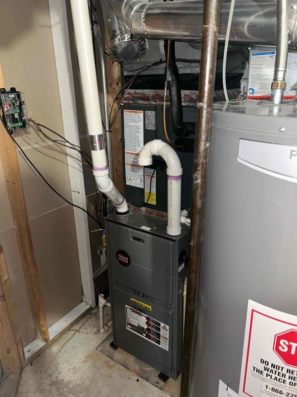 Performed heating safety inspection on Ruud furnace in response to first call regarding possible cracked combustion chamber and yellow/orange flames. Diagnostic assessment revealed significantly rusted heat exchanger with visible cracks and deterioration, confirming unsafe operating condition. Provided customer with replacement options and estimate for new unit installation.
