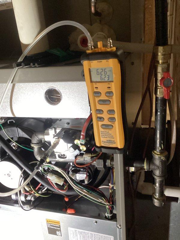 Completed comprehensive furnace tune-up with inspection of all critical components. System is operating within specifications with proper heat exchange (65° temperature rise) and no compromises found in the heat exchanger. Verified condensate drainage, checked pressure readings (623-626), and confirmed multi-stage cycling is functioning correctly. Noted filter is due for replacement soon, but blower assembly is clean and properly balanced.