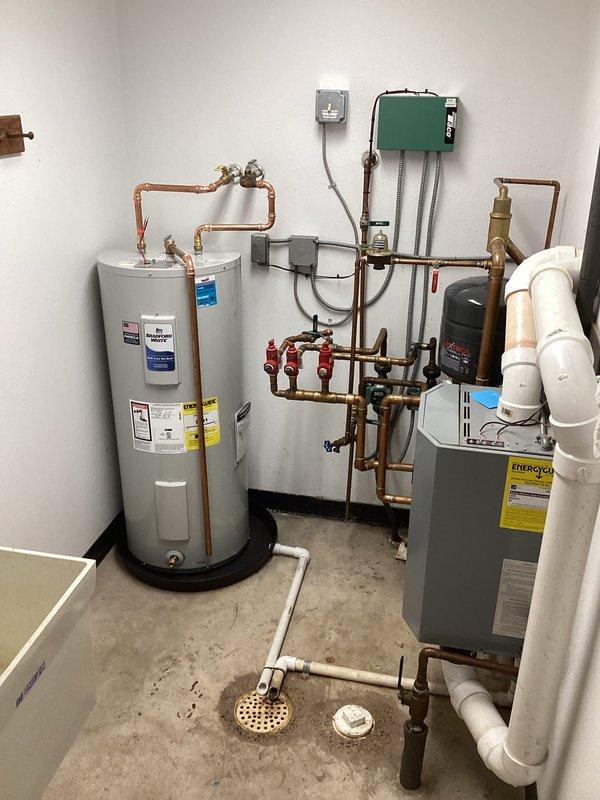 Removed existing boiler mate and installed new 30-gallon electric water heater as requested by customer. Cut and capped boiler side lines and completed all necessary connections to ensure proper functionality of the new unit.