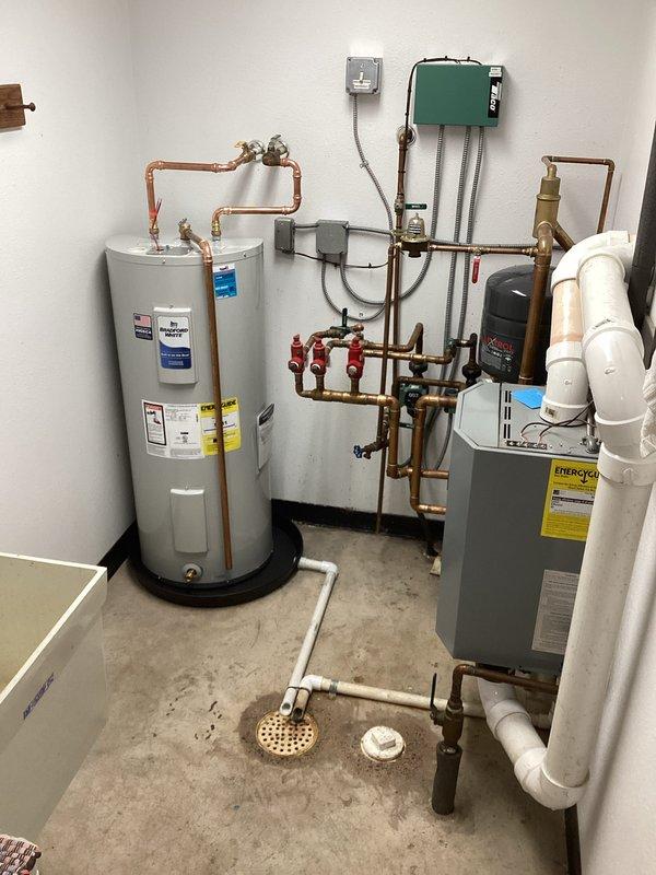 Removed existing boiler mate and installed new 30-gallon electric water heater as requested by customer. Cut and capped boiler side lines and completed all necessary connections to ensure proper functionality of the new unit.