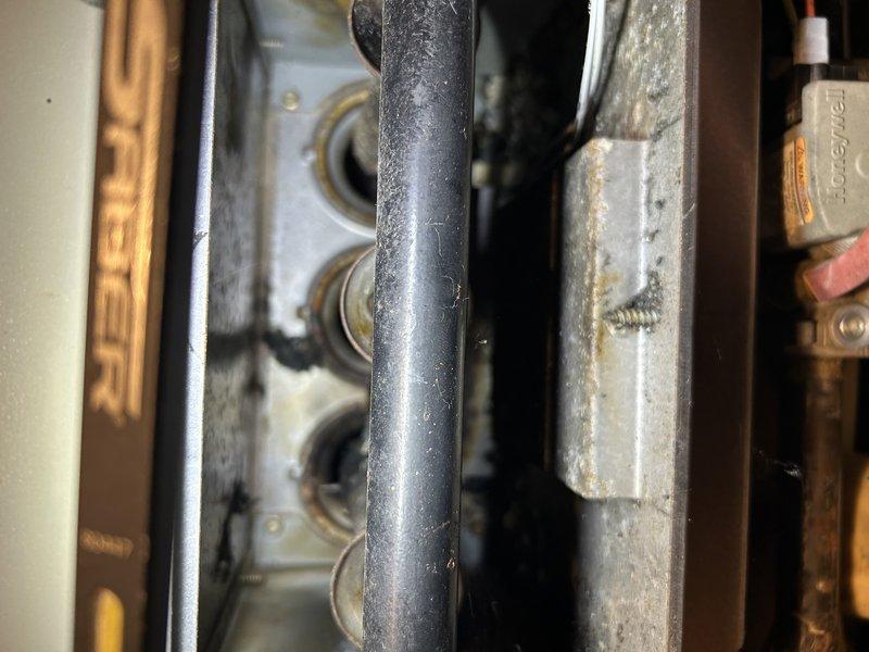 Performed inspection on 25-30 year old Lennox forced air furnace that had been unused for several years while homeowner primarily heated with wood stove. Found evidence of rodent infestation in heat exchanger and significant component damage. Determined replacement of heat exchanger, igniter, flame sensor, and burners necessary before system can safely operate. Advised customer that additional issues may be discovered after initial repairs are completed.