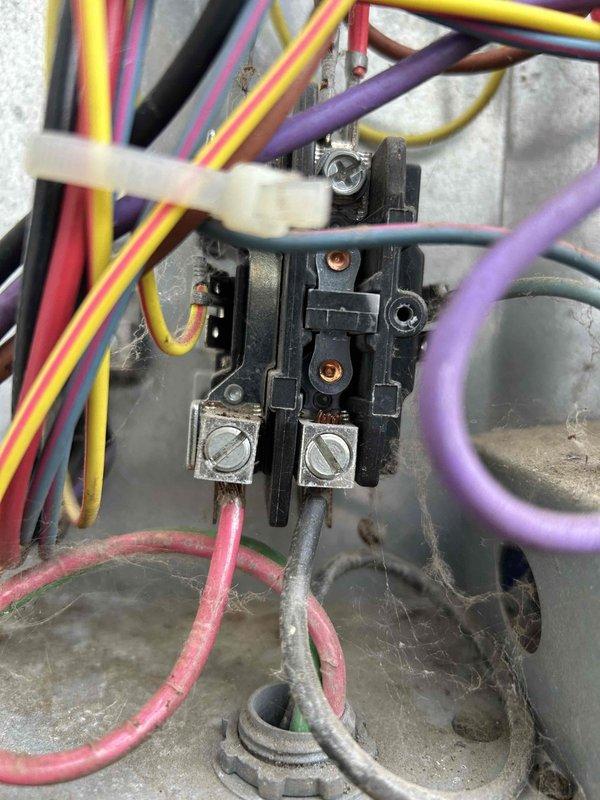 Responded to service call for AC/furnace system that was tripping fuses. Diagnosed two separate electrical issues: incorrectly wired low voltage connection at the saver switch box which was corrected, and severe arcing in the fuse box which presents a safety hazard. Informed landlord that the electrical arcing issue requires professional repair before system can be safely operated.