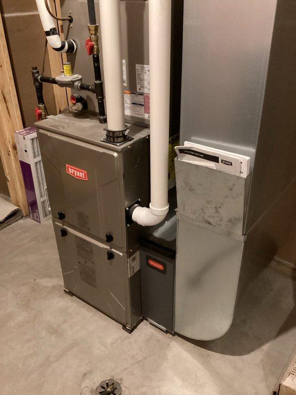 Performed comprehensive maintenance service on 5-year-old FRP system including furnace and AC units. Furnace service included cleaning flame sensor, flushing condensate line, inspecting heat exchanger and blower wheel, and verifying proper electrical components. AC maintenance revealed weak capacitor which was replaced under warranty (previously serviced for same issue); coil was flushed due to dirt accumulation. System now operating efficiently with proper temperature parameters (50°F rise for furnace, 20°F drop for AC).