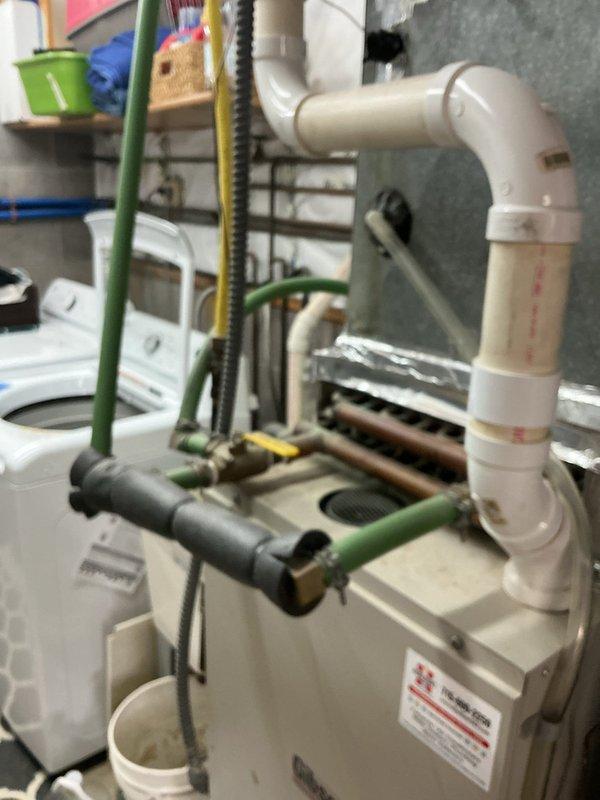 Provided estimate for replacement of 30-year-old 50-gallon LP power-vented water heater. Inspected current Rheem PowerVent system with complex copper/PVC piping configuration and evaluated feasibility of separating wood boiler from existing water heater and furnace. Service advisor scheduled for Friday to deliver formal bid.