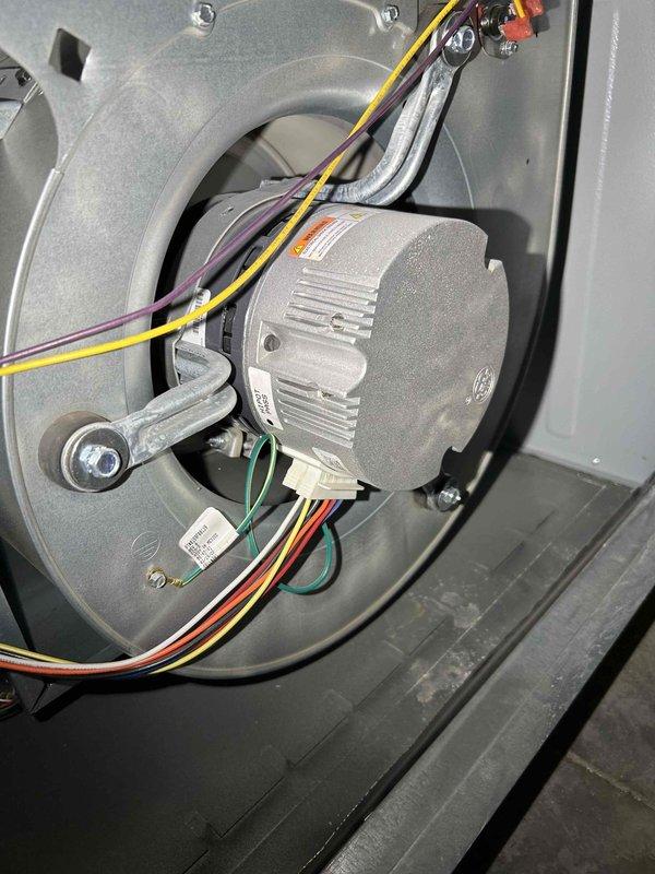 Performed warranty inducer motor replacement on first Goodman furnace after discovering failure caused by bat intrusion. Installed RTF warranty part, replaced filter, and verified proper heating operation. Serviced second Goodman furnace by cleaning gas orifice to restore ignition, adjusted gas pressure from 6" WC to manufacturer specifications, and replaced filter with CO readings at 70 ppm.