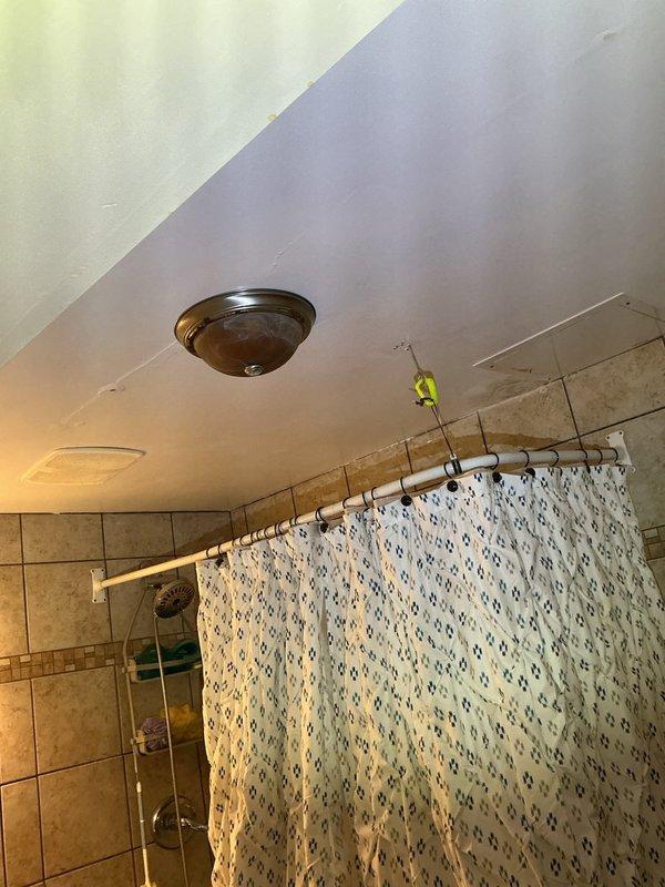 Responded to service call for bathroom issues and diagnosed multiple plumbing problems including broken tub spout, wobbly toilet, and two faulty shower valves with trim kits. Performed visual inspection of bathroom fixtures, identifying signs of deterioration around tub drain and aging fixtures requiring replacement per customer approval.