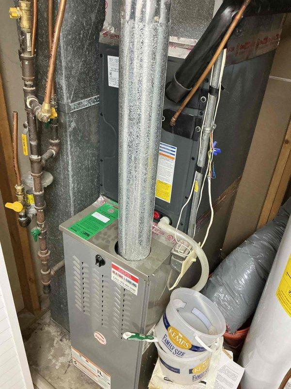 Performed annual maintenance tune-up on 8-year-old Payne furnace. Cleaned dirty flame sensor and identified uncapped gas line from previous appliance removal posing safety hazard. All other components in good working order including igniter, heat exchanger, combustion, gas pressure and temperature rise. Scheduled return visit to replace flame sensor and cap gas line.