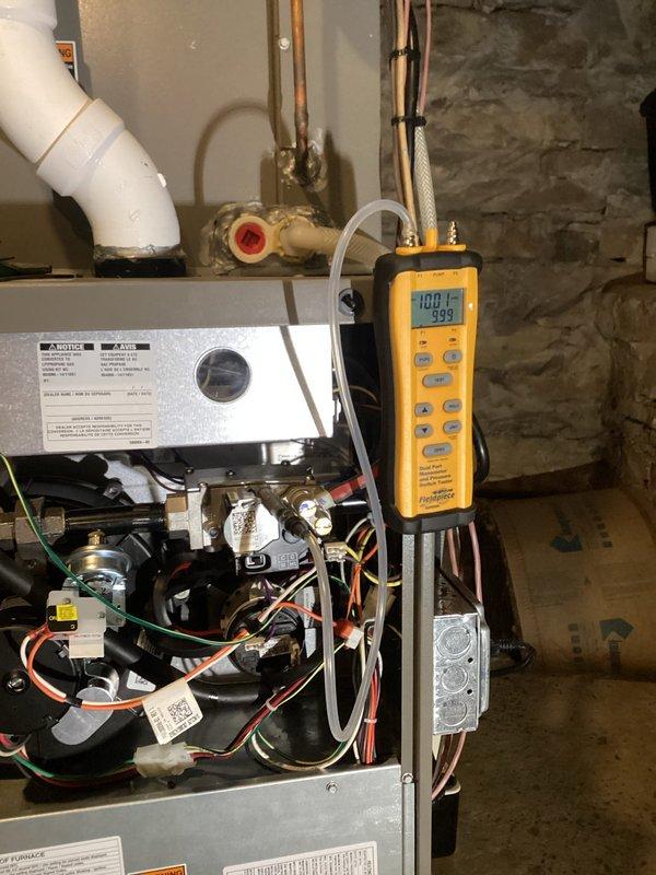 Performed comprehensive furnace tune-up on 3-year-old FRP system, including inspection of all routine components, blower verification (clean and balanced), condensate line clearance, and heat exchanger examination with no compromises found. During testing, adjusted gas pressures (found low fire slightly elevated at 6.6 inwc, adjusted to 6inwc) and confirmed proper system operation with satisfactory 75-degree temperature rise after 15-minute operational test.