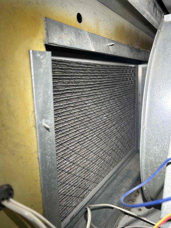 Performed furnace tune-up service, identifying rust buildup on burners and orifice. Adjusted gas valve pressure from 4.7 to 3.5 WC, inspected heat exchanger (no cracks or damage found), and detected elevated carbon monoxide levels over 100 ppm. Recommended installation of CO detectors on multiple floors for safety.