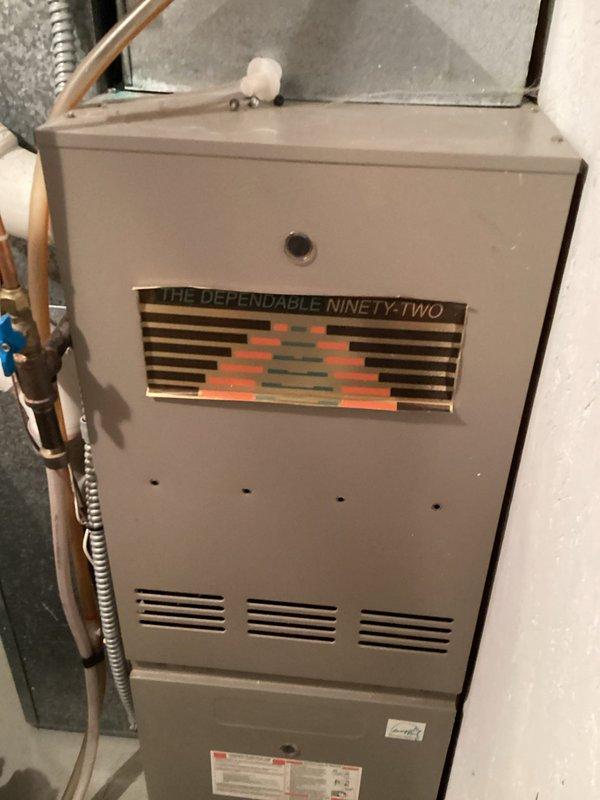 Performed comprehensive furnace tune-up on 22-year-old system (installed 2003) with previously replaced heat exchanger. Inspection revealed heat exchanger in good condition; however, identified hairline crack in collector box requiring attention. Submitted documentation for replacement pricing. Completed standard maintenance procedures and verified system operation.